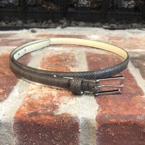 Women’s narrow gray reptile textured belt. 1/2” wide. 36” long.